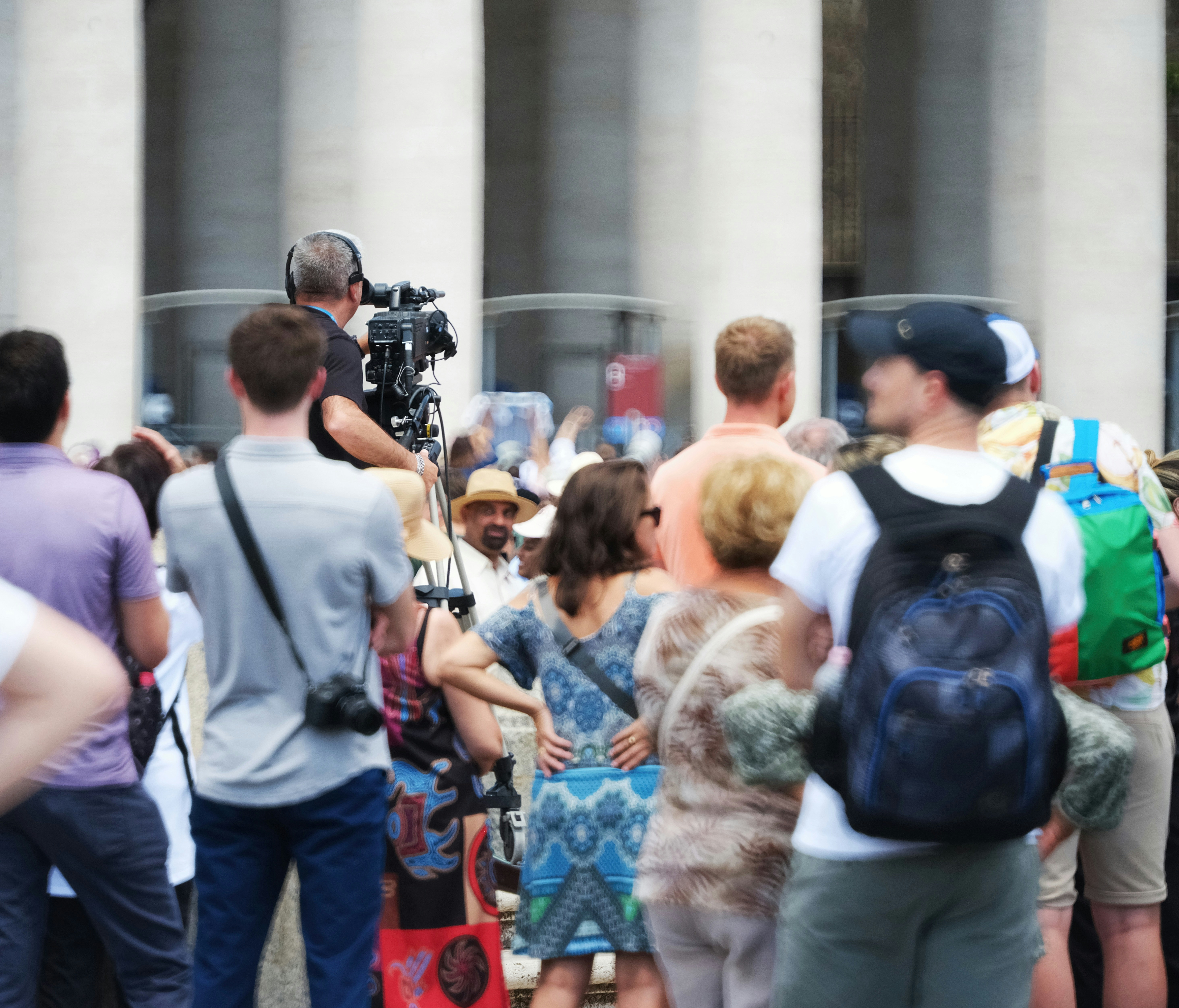 camera man in a crowd of people